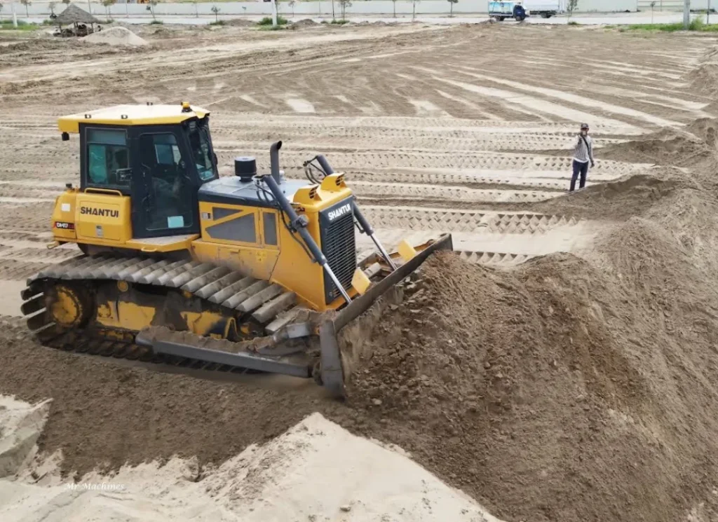 Heavy machine pushing dirt