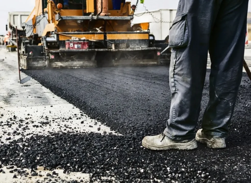 Road asphalt paving
